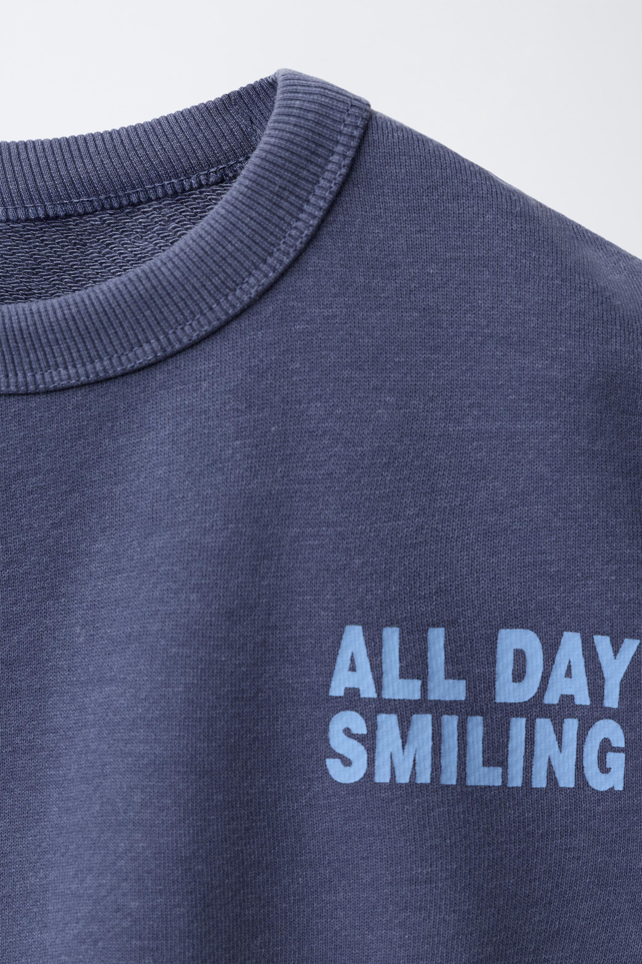 SWEAT AVEC INSCRIPTION IMPRIMÉE